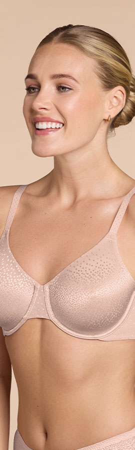 Model wearing a pink back smoothing bra