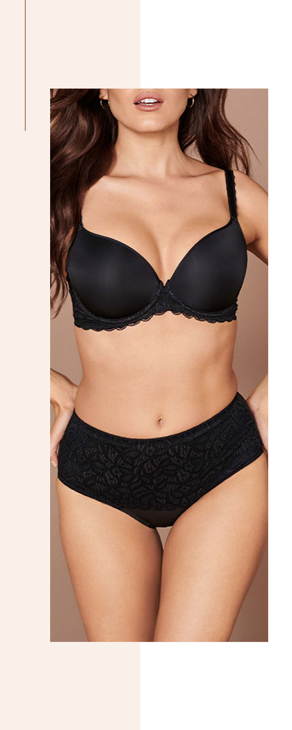 Model wearing a black contour bra with matching shaping briefs
