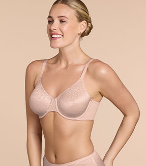 Model wearing neutral coloured smoothing bra